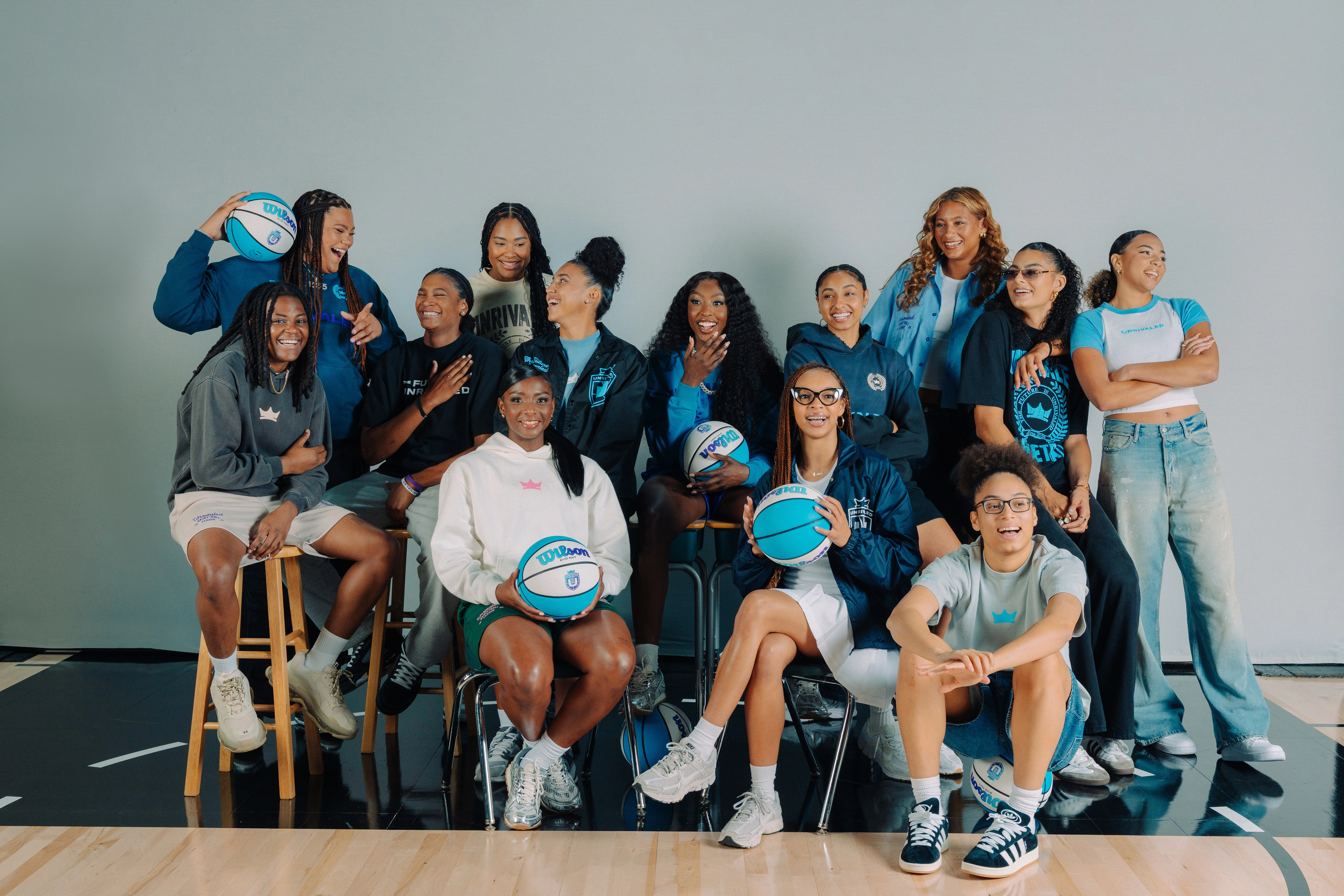 Azzi Fudd, Juju Watkins, and Flau`jae Johnson posing together in a group
